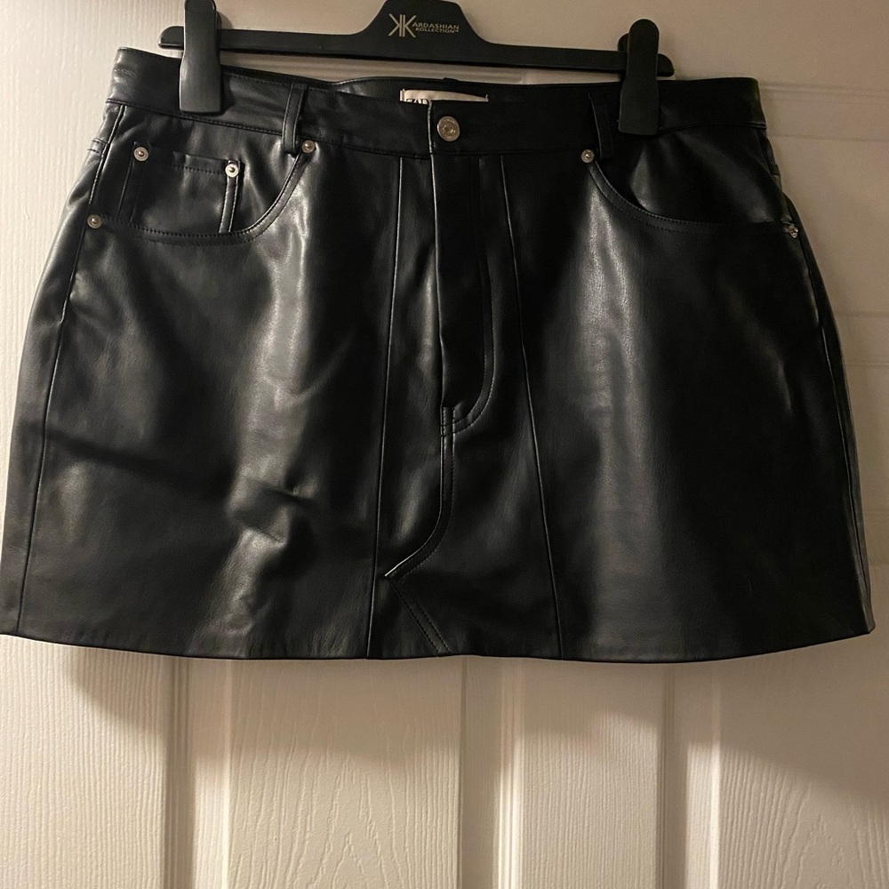 Black leather mini skirt